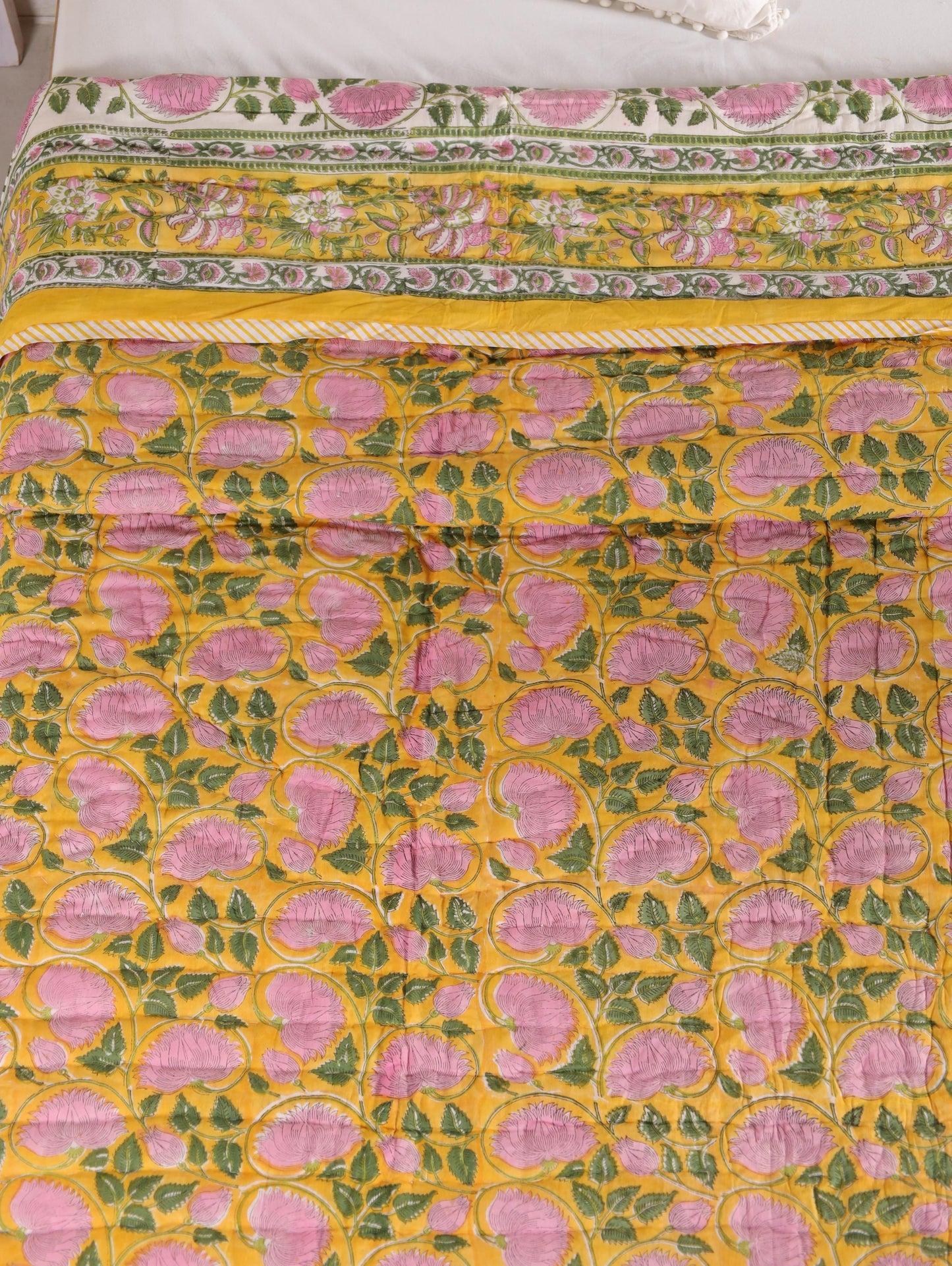 The Amer Sunrise Quilt